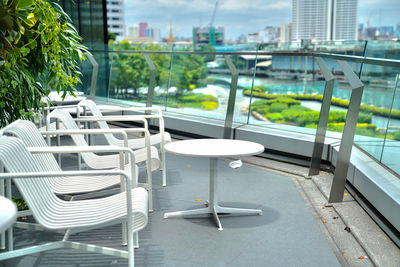 Empty chairs and tables in cafe