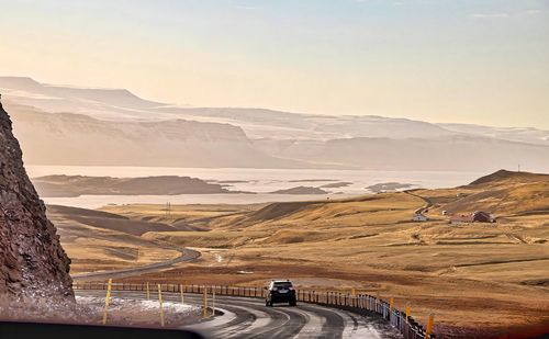 Scenic view of mountains against sky during sunset