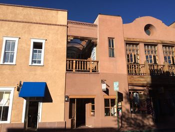 Low angle view of buildings against clear sky