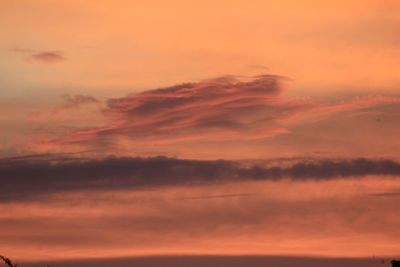 Low angle view of dramatic sky during sunset