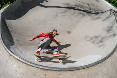 Low section of person skateboarding on skateboard