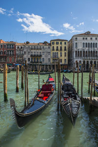 Gondolas parked at canal grande in venice