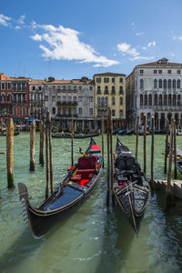 Gondolas parked at canal grande in venice