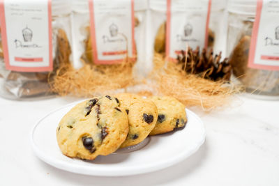 Close-up of cookies in jar on table