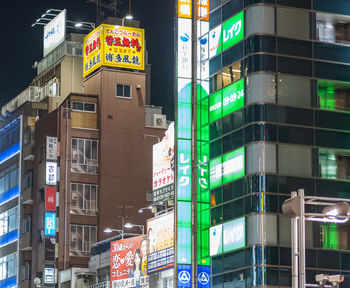 Low angle view of illuminated building at night