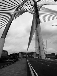 View of bridge against cloudy sky