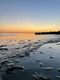 Sunset over selsey beach, uk.