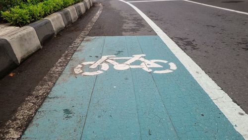 High angle view of text on road