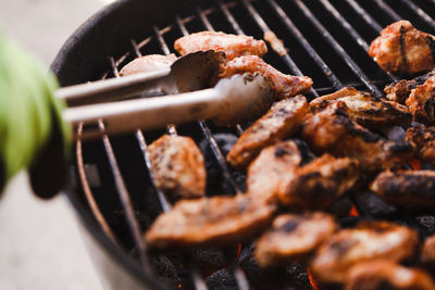 Close-up of meat on barbecue grill
