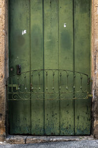 Closed metal door of old building