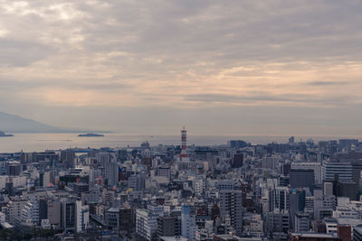 High angle view of buildings against sky during sunset