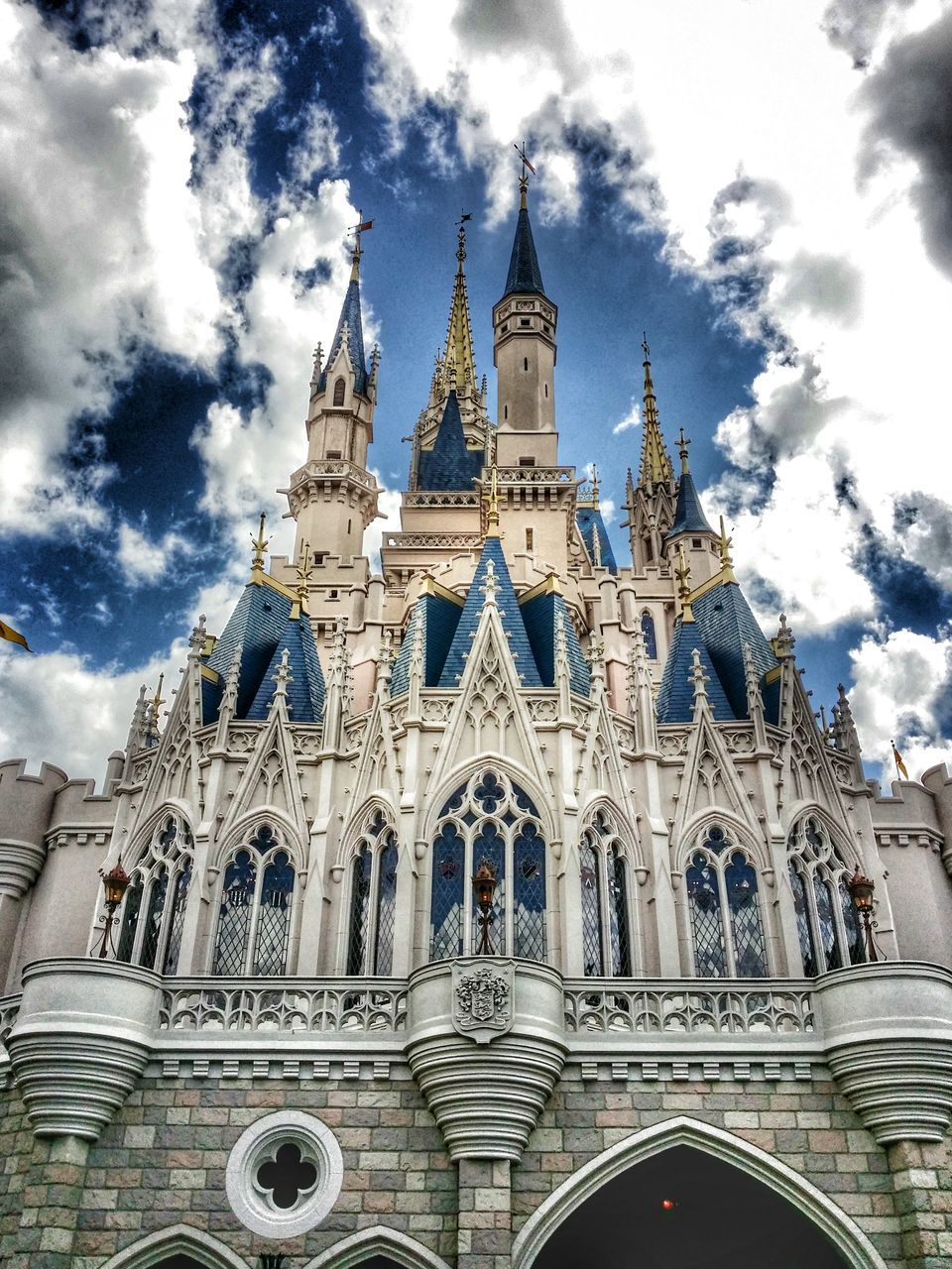 architecture, building exterior, built structure, low angle view, church, religion, place of worship, sky, spirituality, cathedral, cloud - sky, history, travel destinations, arch, cloud, famous place, dome, day