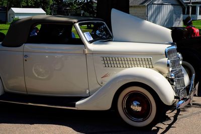 Vintage car parked on road