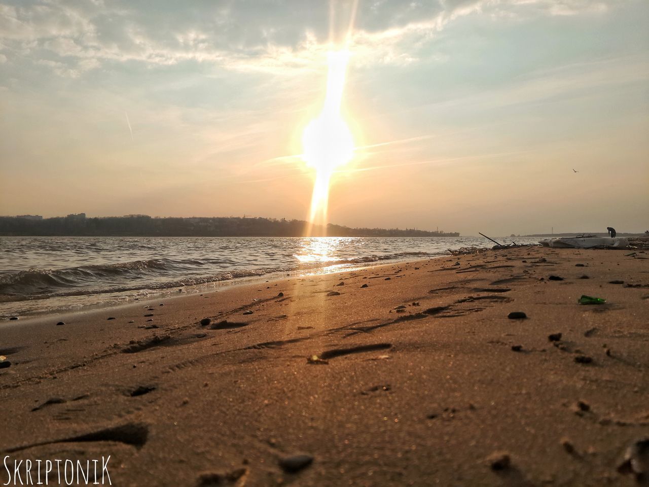 VIEW OF BEACH AT SUNSET