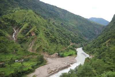 High angle view of river amidst mountains