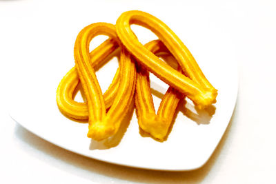 High angle view of lemon in plate on table