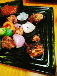 High angle view of food on barbecue grill