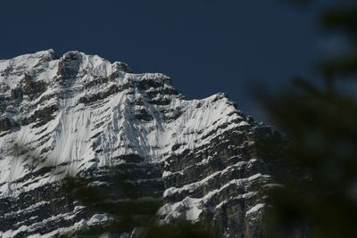 Low angle view of snowcapped mountain