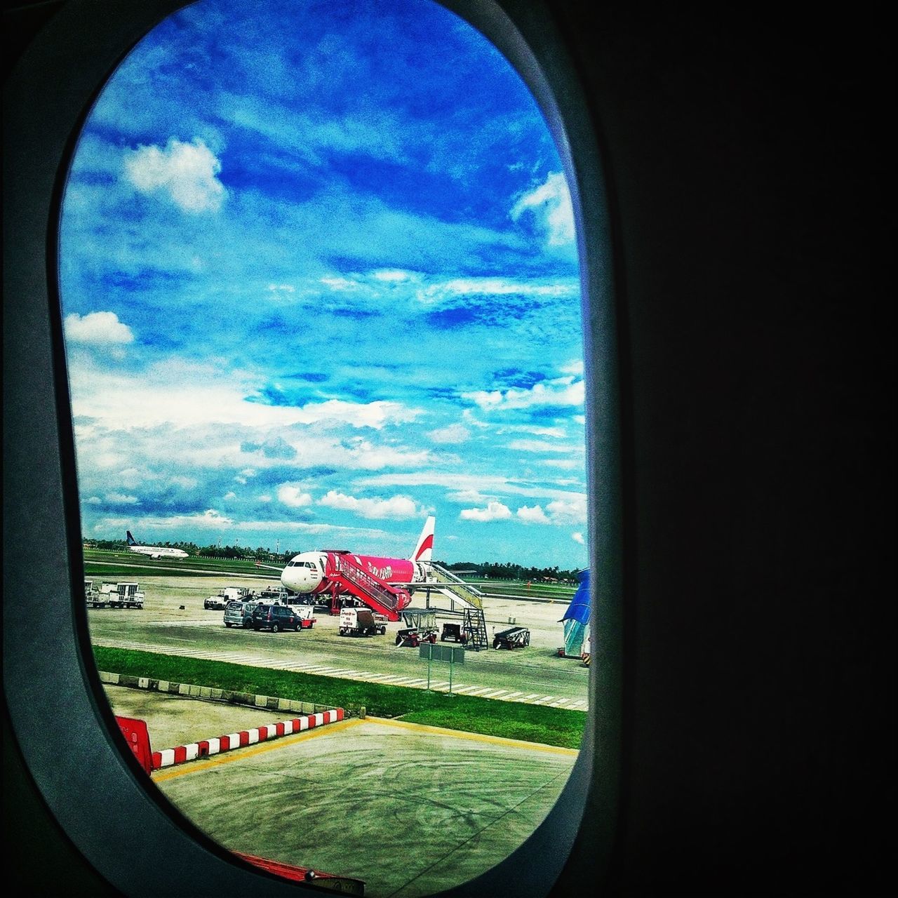 transportation, sky, mode of transport, car, window, cloud - sky, vehicle interior, land vehicle, transparent, glass - material, road, cloud, airplane, air vehicle, fish-eye lens, cloudy, indoors, landscape, looking through window, street