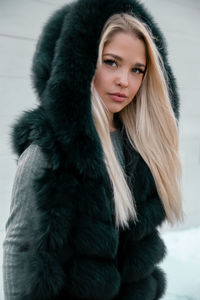 Portrait of woman in snow