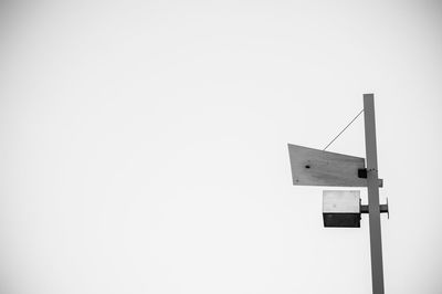 Low angle view of street light against clear sky