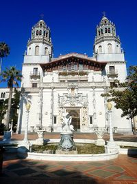 Statue of historic building against sky