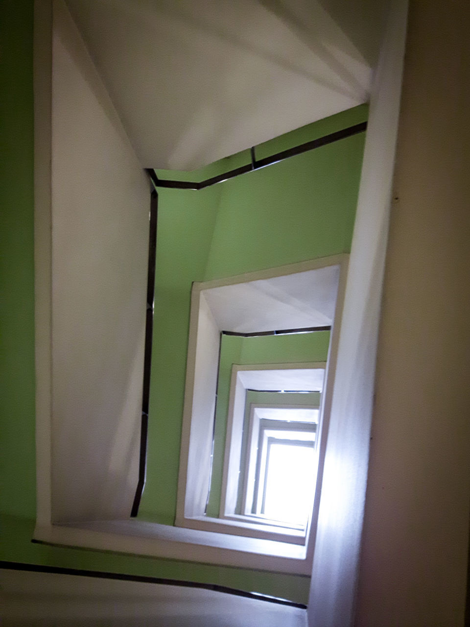 LOW ANGLE VIEW OF STEPS IN STAIRCASE