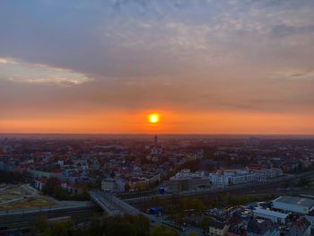 High angle view of townscape against sky during sunset