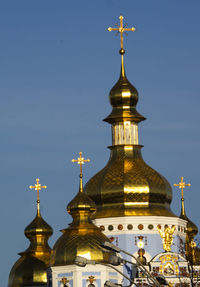 Low angle view of st michael golden-domed monastery against sky