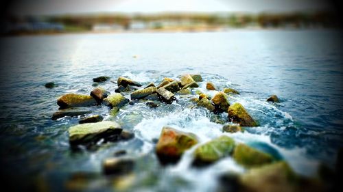 Water flowing in sunlight