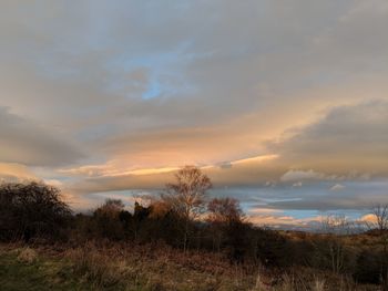 Scenic view of landscape against sky during sunset