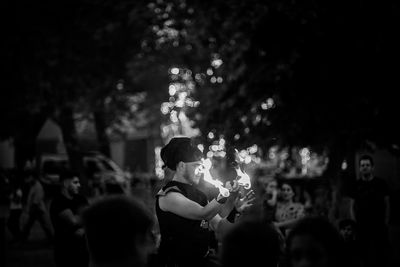 Group of people enjoying at night