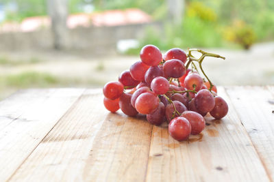 Close-up of cherries on table