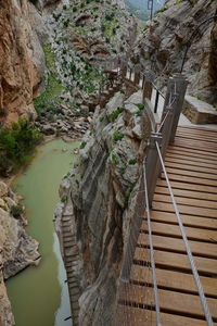 High angle view of steps amidst rocks and mountains