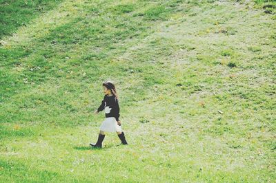 Man standing on grassy field