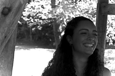 Portrait of smiling young woman outdoors