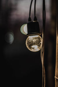 Close-up of glass of hanging light