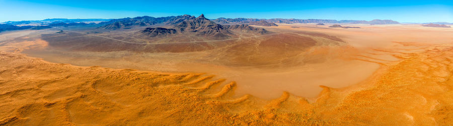 Scenic view of desert against sky