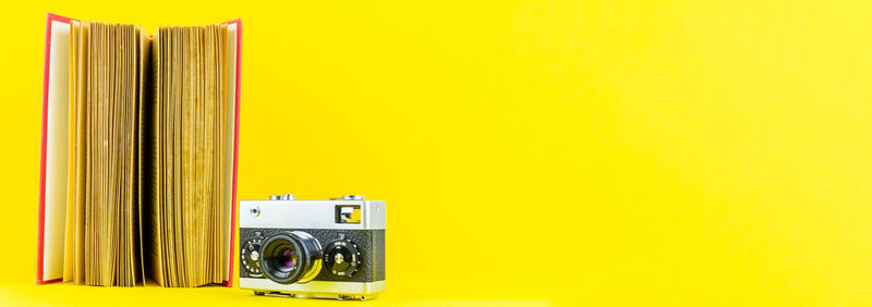 Close-up of camera against wall