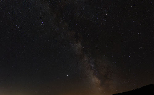 Low angle view of stars in sky at night