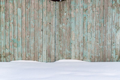 Snow on wood during winter