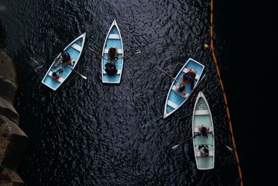 High angle view of people in boat on sea