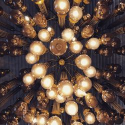 Low angle view of illuminated chandelier