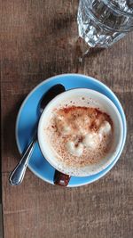 Directly above shot of coffee served on table