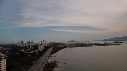 Panoramic view of city and buildings against sky