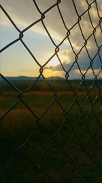 Chainlink fence seen through chainlink fence