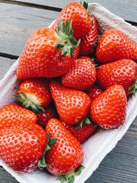 High angle view of strawberries on table