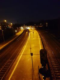 High angle view of light trails on railroad tracks