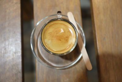 High angle view of coffee cup on table