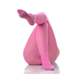 Close-up of pink statue against white background